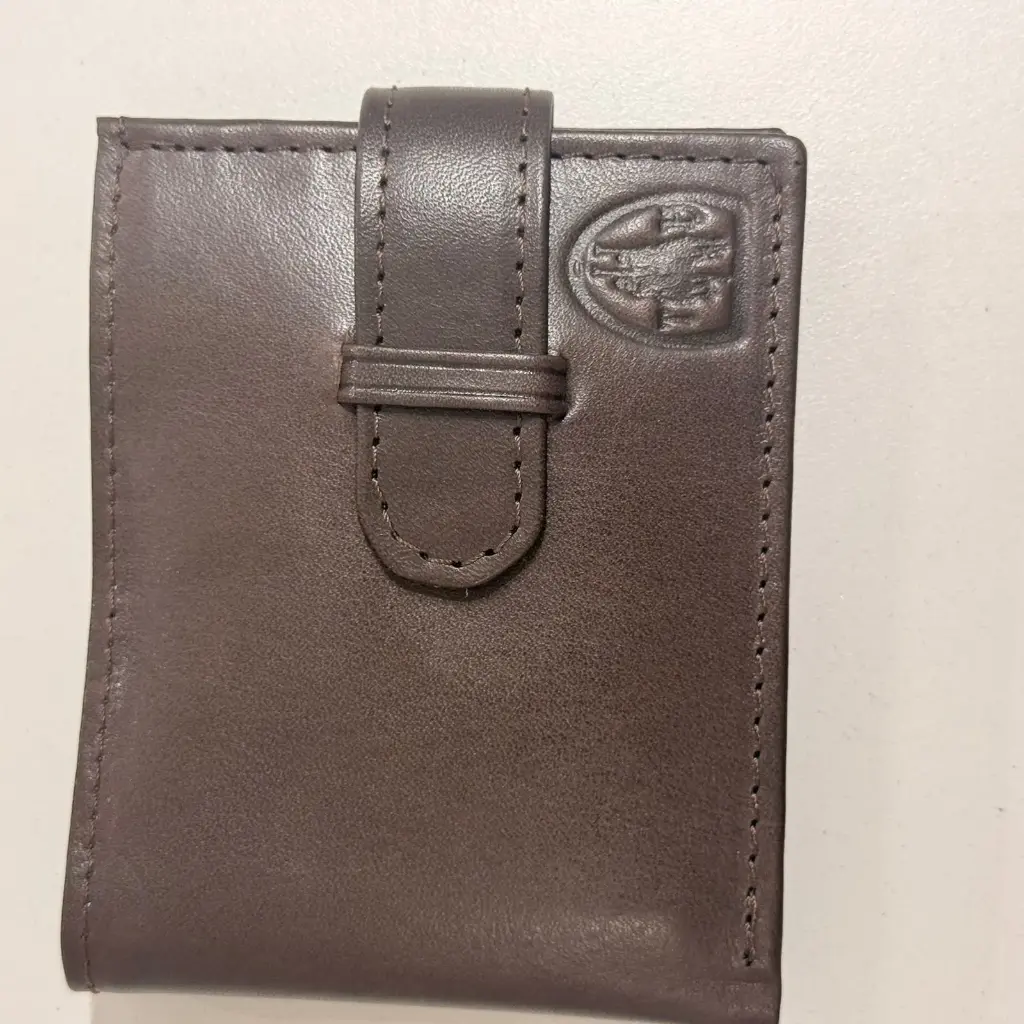 BILLETERA DE CUERO C/1VOL Y RAB (130) CH